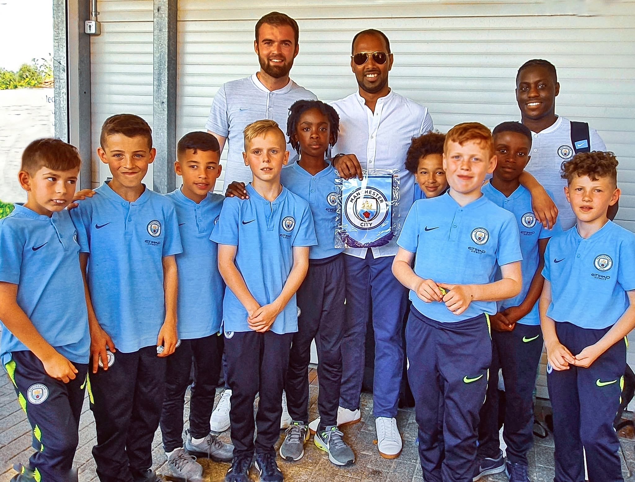 Chris Punnakkattu Daniel on the road with the Manchester City FC U10s team and coaching staff.