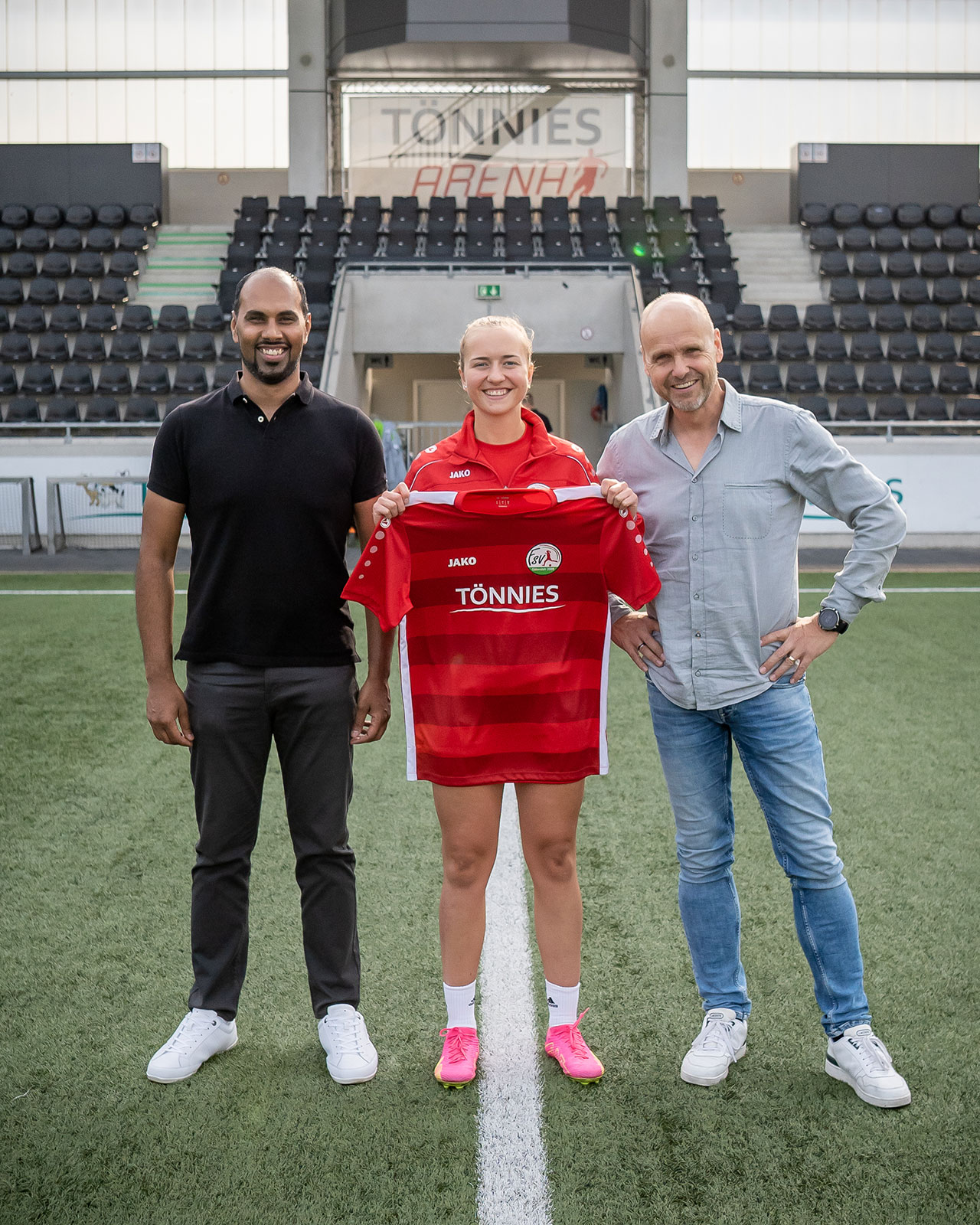 Chris Punnakkattu Daniel pictured with German footballer Nele Schmidt and Markus Graskamp.