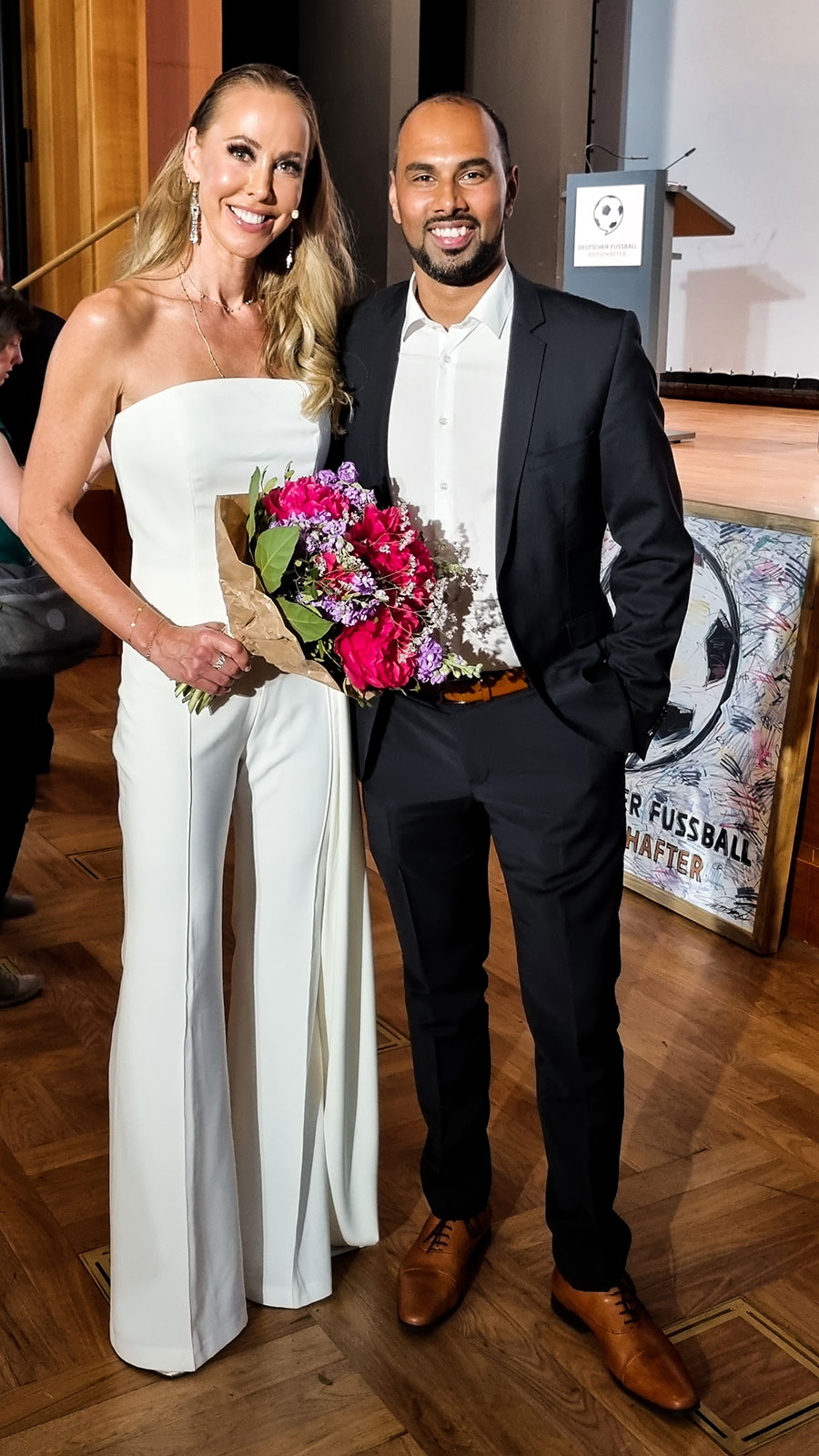 Chris Punnakkattu Daniel alongside TV presenter Sylvia Walker at the German Football Ambassador Awards 2022.